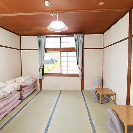 Guest House Shikotsu Kamui Тітосе Екстер'єр фото