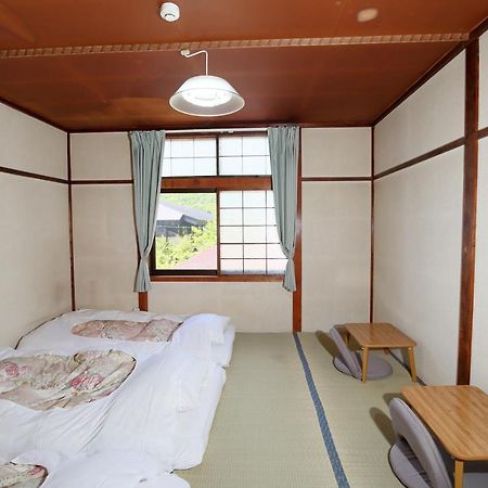 Guest House Shikotsu Kamui Тітосе Екстер'єр фото