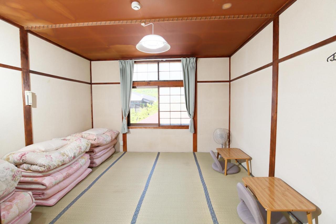 Guest House Shikotsu Kamui Тітосе Екстер'єр фото