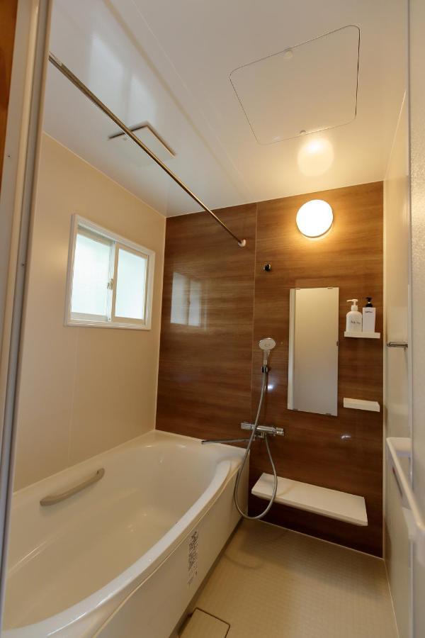 Guest House Shikotsu Kamui Тітосе Екстер'єр фото