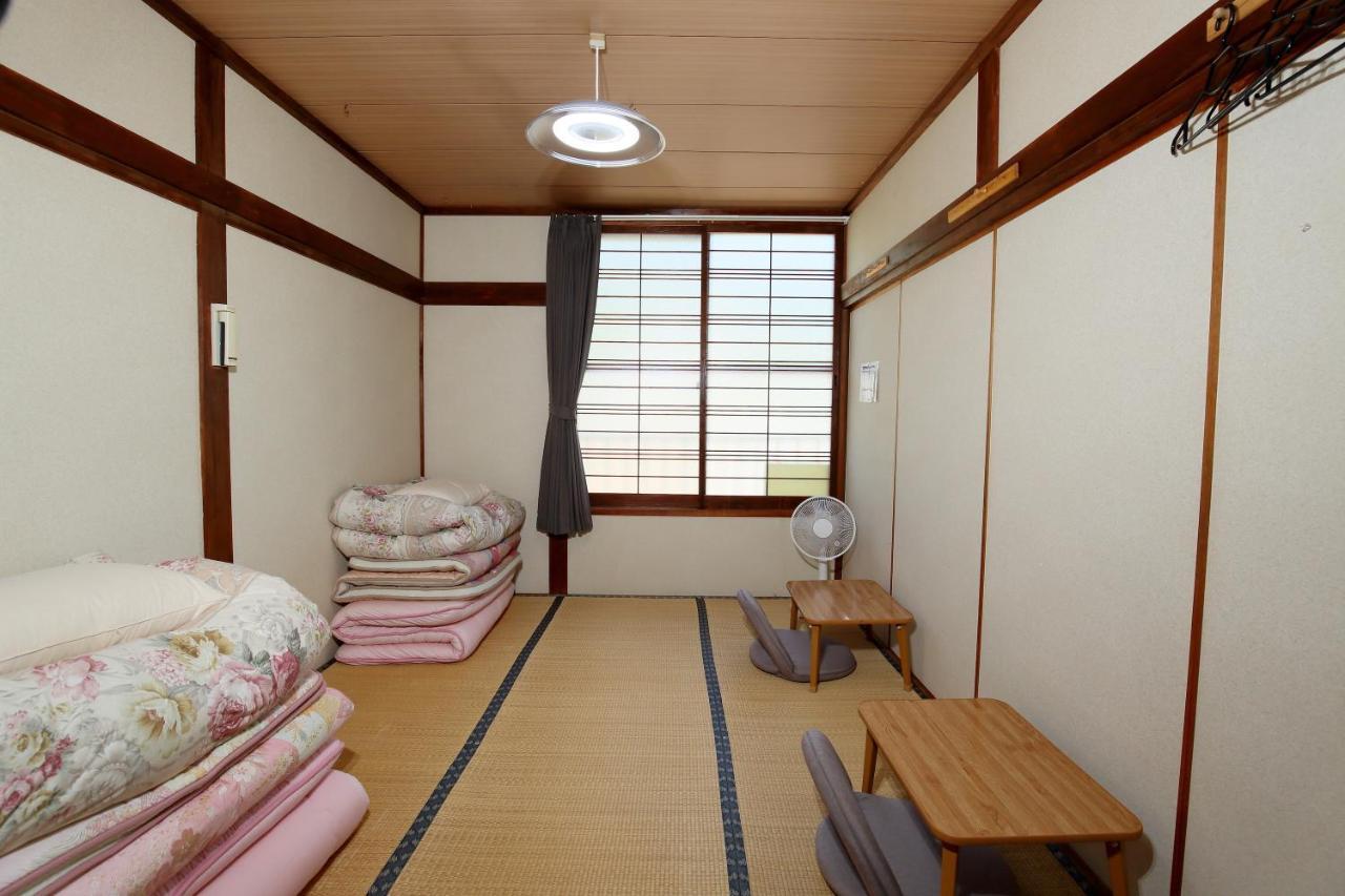 Guest House Shikotsu Kamui Тітосе Номер фото