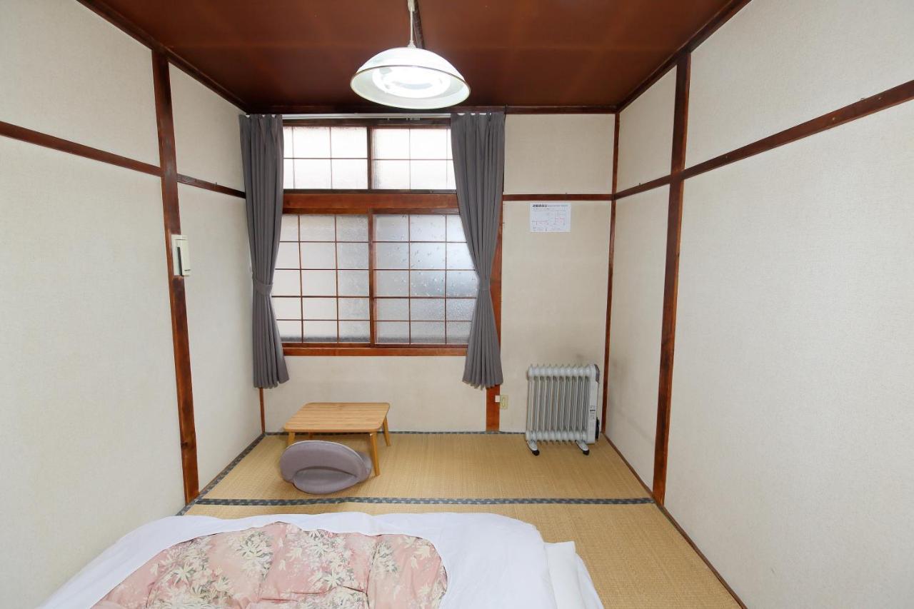Guest House Shikotsu Kamui Тітосе Екстер'єр фото