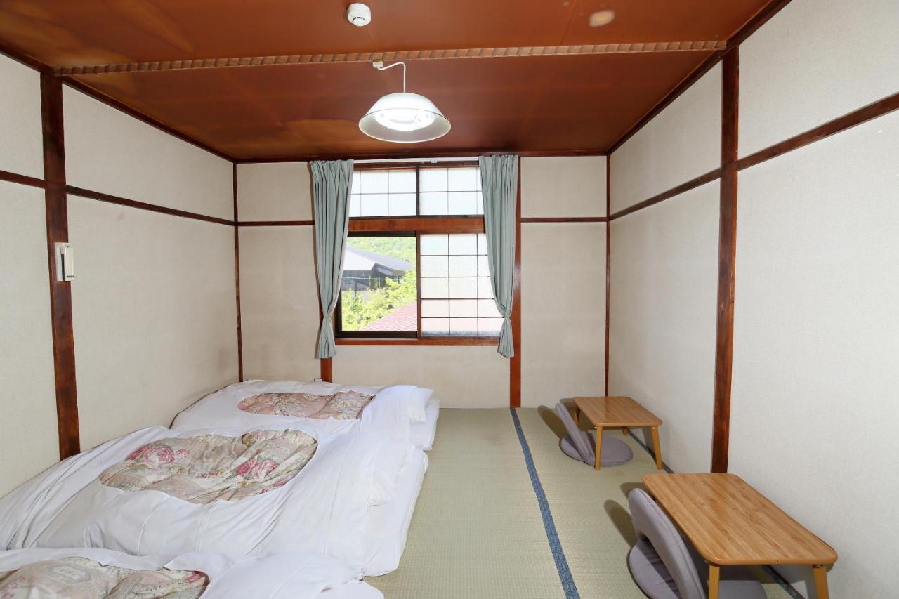 Guest House Shikotsu Kamui Тітосе Екстер'єр фото