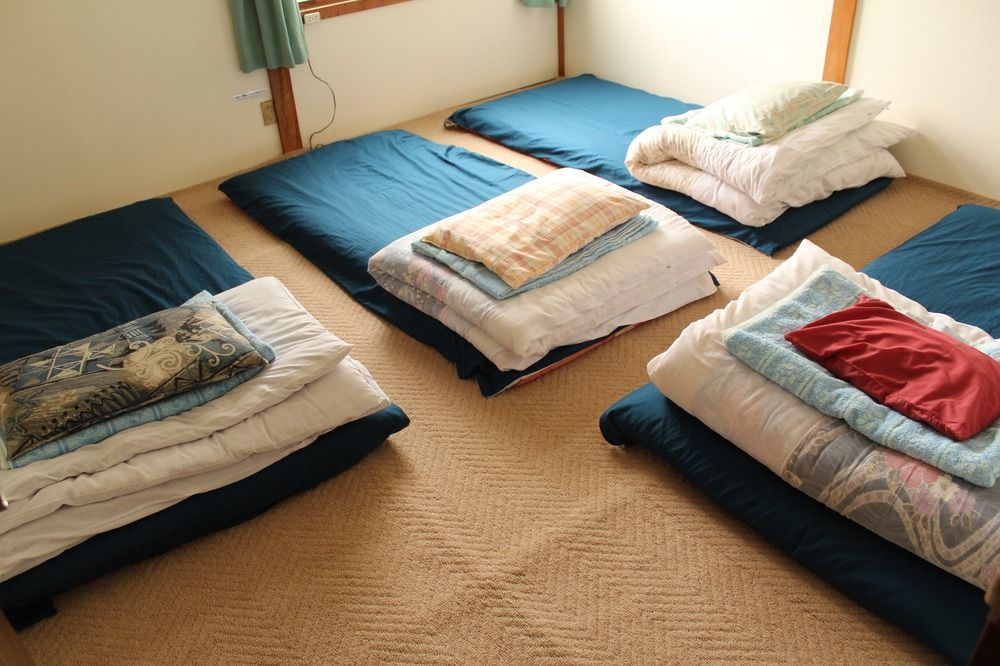 Guest House Shikotsu Kamui Тітосе Екстер'єр фото