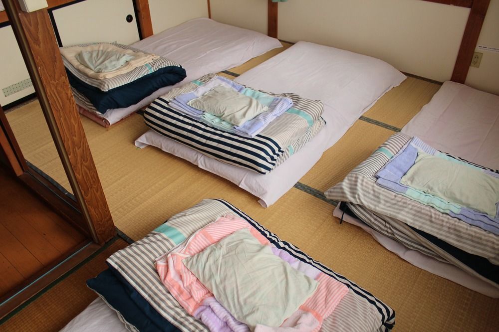 Guest House Shikotsu Kamui Тітосе Екстер'єр фото